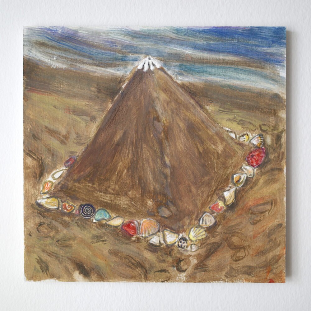 Trying to touch grass exept it's sand